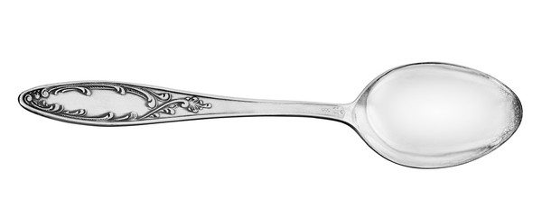 Silver spoon close-up on isolated white background