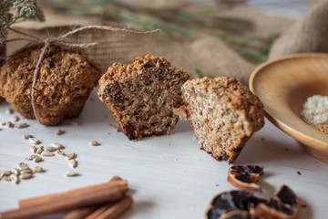 Whole wheat flour muffins. Sugar-free dessert, Healthy diet. Beautiful composition of flowers, ingredients and dessert