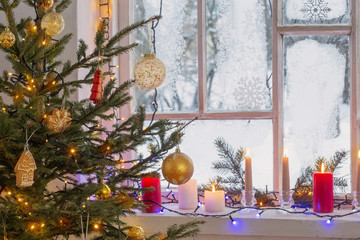 Christmas decorations on old wooden window