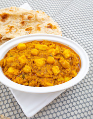 North Indian Healthy Cuisine Chole Paneer or Chole Paneer Curry Served with Tandoori Roti, Made From Boiled Chickpea with Cottage Cheese and Spices