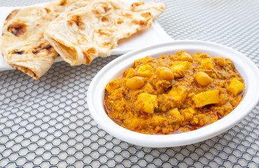 North Indian Healthy Cuisine Chole Paneer or Chole Paneer Curry Served with Tandoori Roti, Made From Boiled Chickpea with Cottage Cheese and Spices