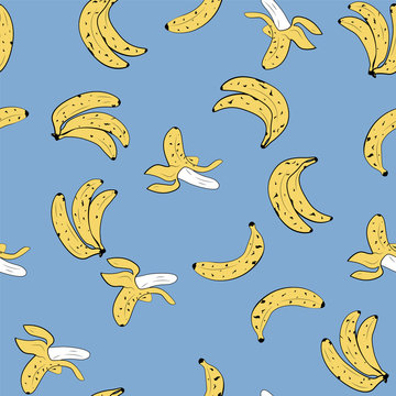 Seamless vector pop art style pattern of bananas randomly distributed on blue background