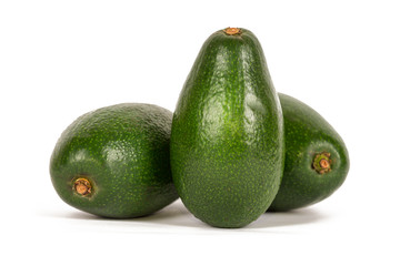Ripe avocados on a white background.