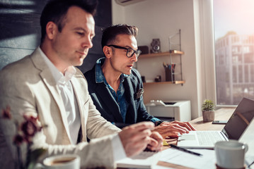 Two business people working together in the office