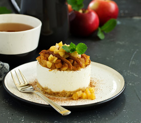 Cheesecake with apples and caramel. New Year's dessert. Selective focus