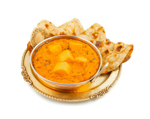 Indian Popular Vegetarian Cuisine Cheese Butter Masala Also Know as Cheese Cottage Curry or Paneer Butter Masala Served With Tandoori Roti on Isolated White Background
