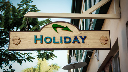 Street Sign to Holiday