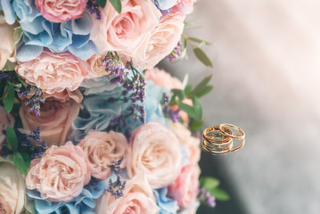 Wedding flowers and newlyweds rings