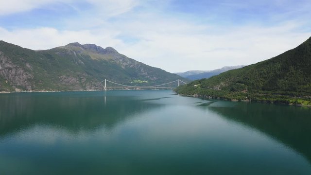 The Hardanger Bridge is a suspension bridge across the Eidfjorden branch of Hardangerfjorden in Hordaland county, Norway.