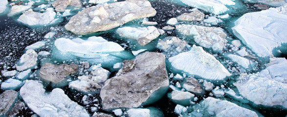 Iceberg and ice from glacier in arctic nature landscape on Greenland