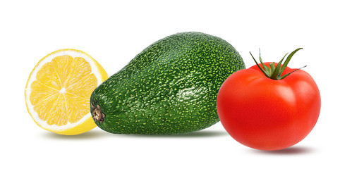 Fresh avocados with lemon and tomato isolated on white background with clipping path