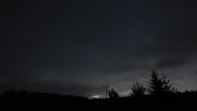 Night skyDSLR time lapse of circumpolar stars over Davagh Forest in N. Ireland with wide angle lens