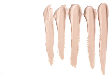 Smears of liquid foundation for makeup