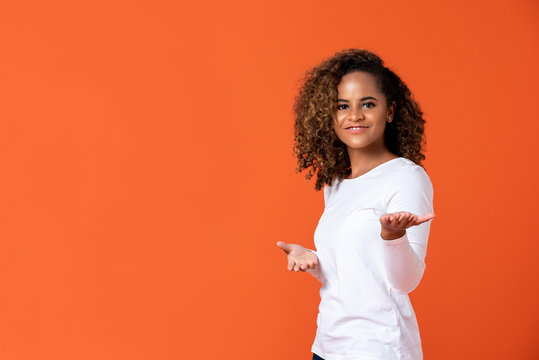 Happy African American Woman Doing Welcome Or Presenting Gesture