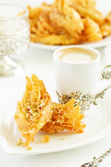 Honey baklava with nuts. Eastern sweetness. Selective focus