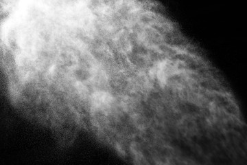 A stream of water and a cloud of drops