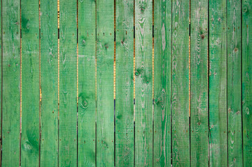 Green fence of wooden planks texture background