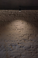 Modern design of a white brick wall with lighting