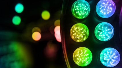 An illuminated colorful led light against bokeh background