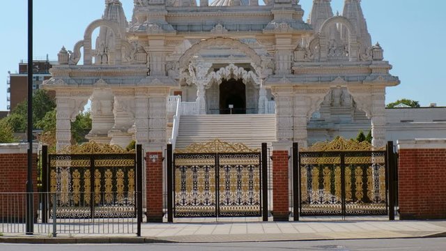 Close-up shot of the BAPS Shri Swaminarayan Mandir Hindu temple in Neasden, London, one of the largest Hindu temples outside India