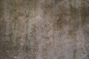 Detail of an old wall with dirty and damp plaster