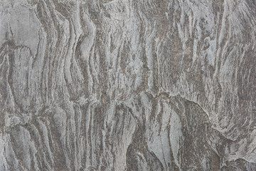 Beautiful old colored sedimentary rock texture closeup