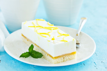 piece of lemon cake on a light background.
