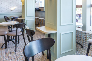  wooden eco tables and chairs in a youth cafe