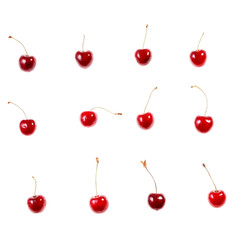 Fresh cherries on white background. Juicy summer berry close-up.