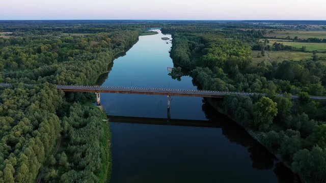 Aerial view of beautiful flood-meadow and river flood.Flying above beautiful Desna river when the river is full of water at spring at National Nature Park in Chernihiv Oblast, Ukraine.
