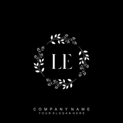 letter LE surrounded by beautiful and elegant flowers and leaves. Wedding monogram logo template. Fashion Logo template Vectors,