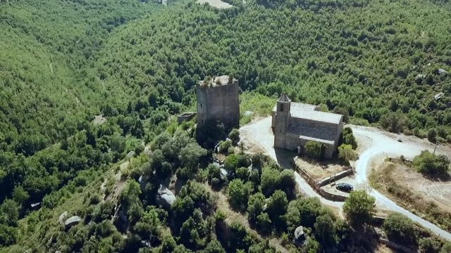 Aerial view of the Riner castle, church and tower near Solsona, Catalonia, Spain, Europe.
Hign angle counterclockwise orbit.