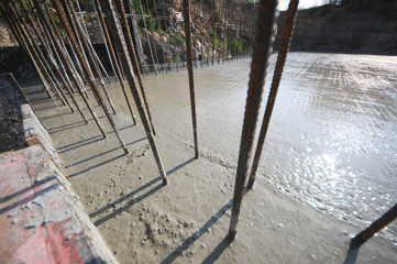 Concrete pouring during commercial concreting floors of buildings in construction