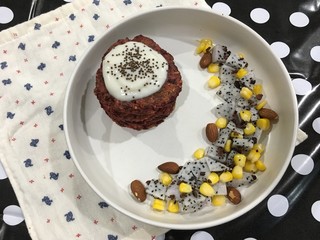 Red velvet pancakes with yogurt mixed dragon fruit and corn and almonds
