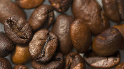 coffee frame of roasted beans in the brown colors natural background