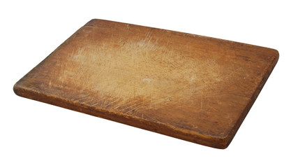 Old grunge wooden cutting board isolated. Rustic kitchenboard on white background.