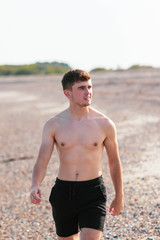 Fototapeta premium Shirtless on a beach
