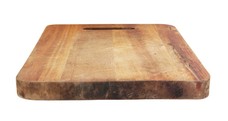Old wooden kitchen cutting board isolated on white background
