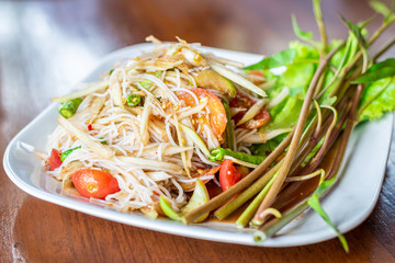 Papaya salad or Som Tum, Thai cuisine spicy one of famous street Thai food.