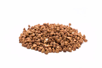 Pile of buckwheat isolated on white background. Top view.