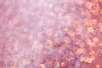 Pink blurred light background with bokeh effect
