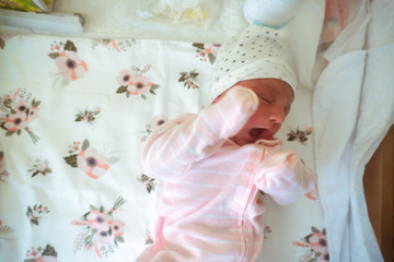 Portrait of a cute newborn girl