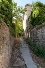 small alley in village medieval Oppède-Le-Vieux Lubéron France