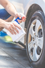 Car care, wheel rim cleaning and polishing.