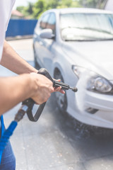 Self car washing by using high pressure water.