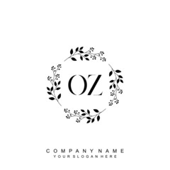 letter OZ surrounded by beautiful and elegant flowers and leaves. Wedding monogram logo template. Fashion Logo template Vectors,