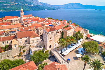 Historic town of Korcula towers and town gate aerial panoramic view