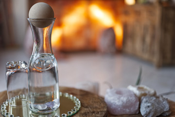 glass of water and bottle on a table