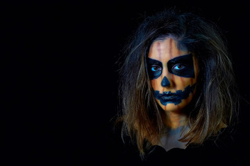 portrait of a woman dressed as halloween pumpkin