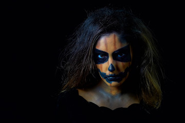 portrait of a woman dressed as halloween pumpkin